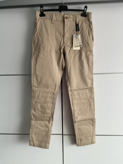 Beżowe spodnie męskie Mango Man tapered fit, widok z przodu